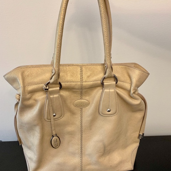 Large Tod’s purse in gold - Picture 1 of 12
